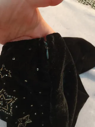 Falda mini negra con estrellas plateadas