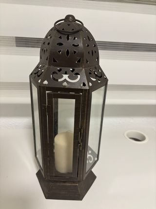 Portavelas decorativo de metal y cristal