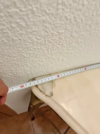 Consola de entrada dorada con espejo