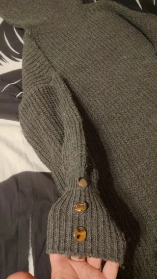 Jersey de punto cuello alto gris