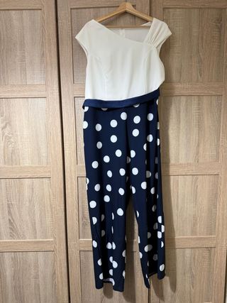 Mono de vestir azul con lunares blancos