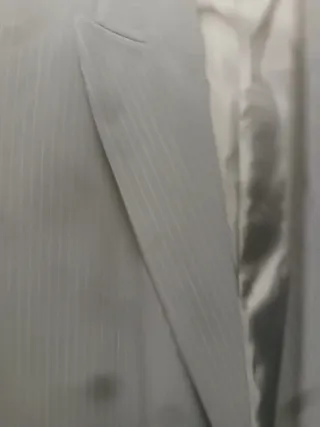 Americana negra con rayas finas,sin estrenar