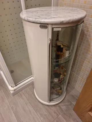 Mueble baño giratorio redondo cristal