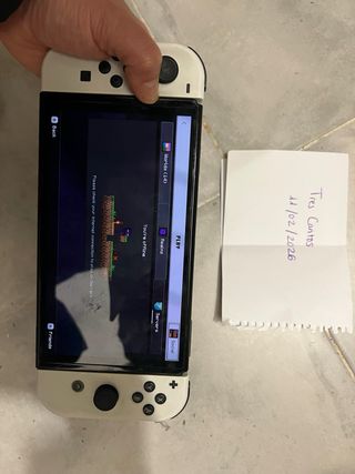 Nintendo Switch OLED con 7 giochi e borsa