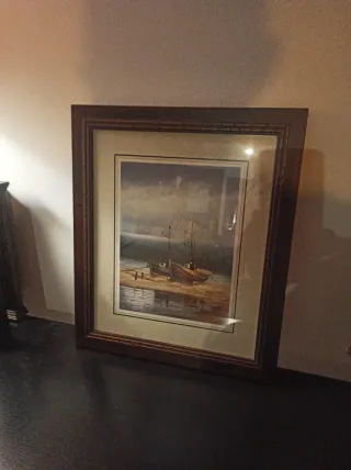 Cuadro de barcos en la playa