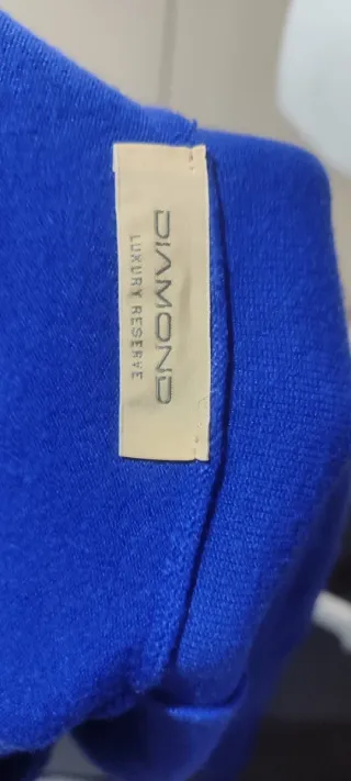 Maglioni uno fantasia beige e marrone e maglia