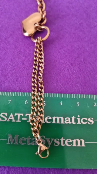 Pulsera doble cadena corazón oro