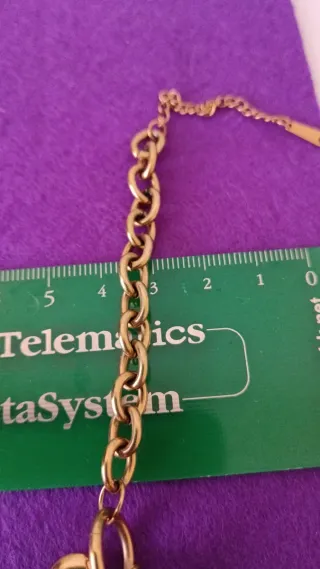 Pulsera doble cadena corazón oro