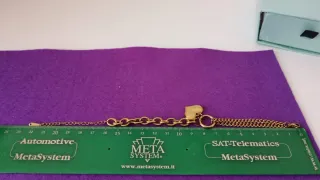 Pulsera doble cadena corazón oro