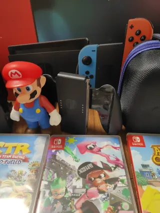 Nintendo Switch con su caja + 1 Juego + funda