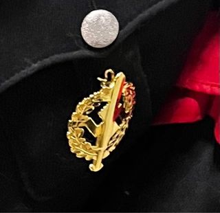 Gorra, cinturón e insignia alemana