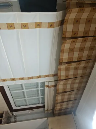 Cortinas variadas con estores.