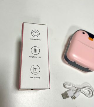 Impresora térmica rosa con forma de pingüino