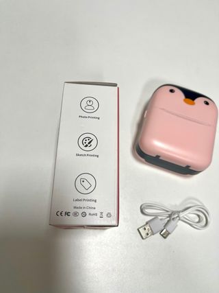 Impresora térmica rosa con forma de pingüino