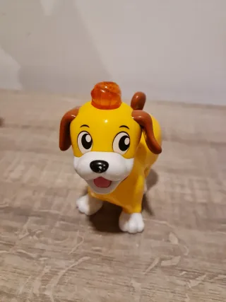Juguete perro amarillo con luz