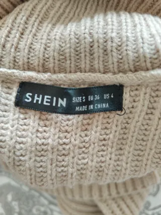 Jersey crop de cuello alto beige