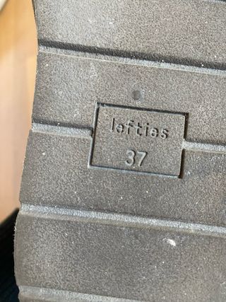 Botas de pelo grises