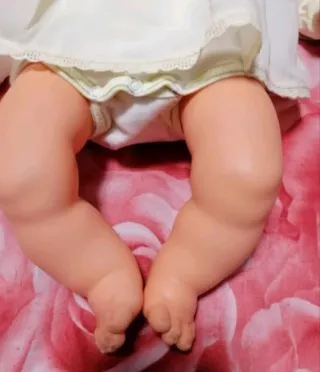 Muñeca antigua con chupete