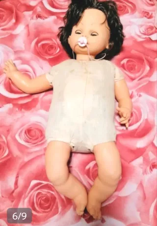 Muñeca antigua con chupete
