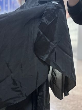 Capa de peluquería negra