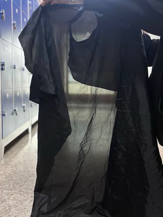 Capa de peluquería negra