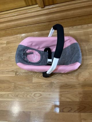 Asiento de coche para muñecas.