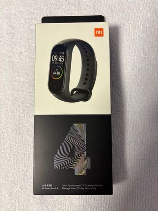 Xiaomi Mi Band 4 con caja, cargador y correa extra