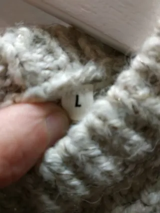 Jersey trenzado beige.