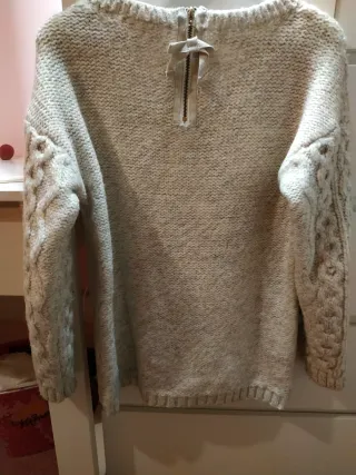 Jersey trenzado beige.
