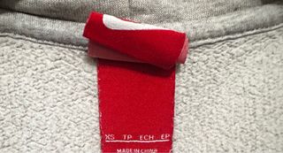 Felpa Nike con cappuccio grigia e bianca