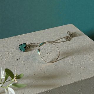 Collar y pulsera mariposa turquesa
