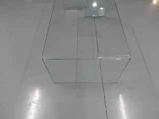 Mesa baja cristal con revistero