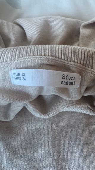 Jersey cuello alto beige