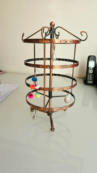 Porta orecchini/gioie girevole