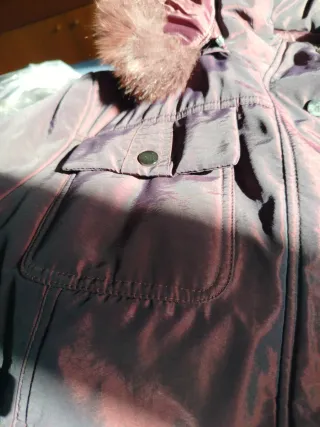 Giubbotto vinaccia con cappuccio e pelliccia