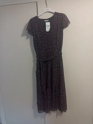 Vestito pois nero e fucsia