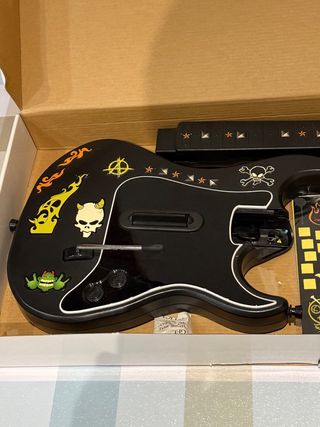 Guitar Hero de Playstation 2 y Guitarra