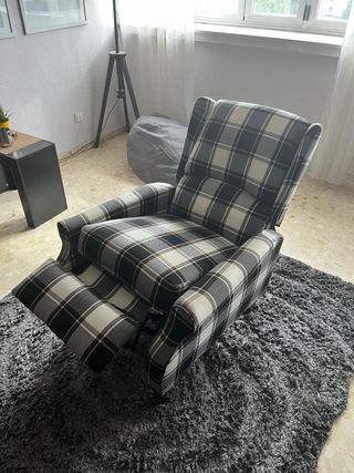 Sillón de tela a cuadros con masaje