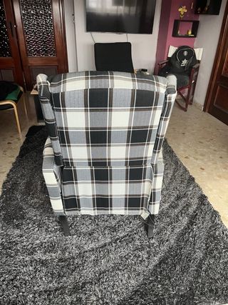 Sillón de tela a cuadros con masaje