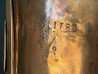 Medidor grande de cobre con asas