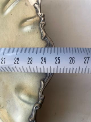 Piatto antico in argento con piedini