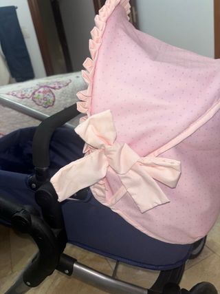 Carrito de muñecas rosa