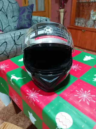 Casco de moto negro incluye braga para el frio