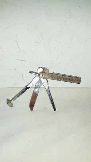 Herramienta multiusos limpiador pipas antigua