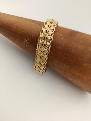 Pulsera dorada eslabones florales