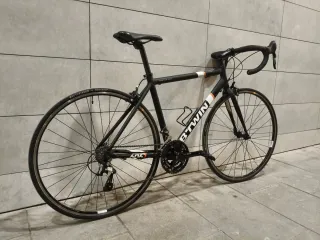 BICICLETA CARRETERA BTWIN TRIBAN 500