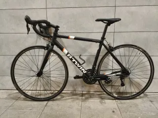 BICICLETA CARRETERA BTWIN TRIBAN 500