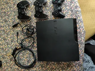 Consola PS3 Slim Negra + Volante y Juegos