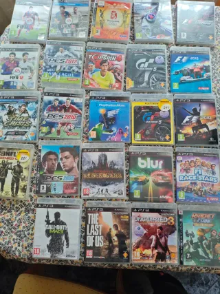 Consola PS3 Slim Negra + Volante y Juegos