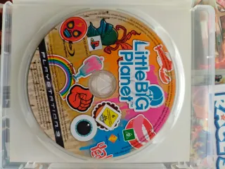 Consola PS3 Slim Negra + Volante y Juegos